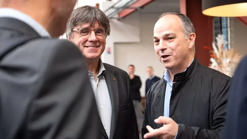 En la imagen de archivo los dirigentes de Junts Carles Puigdemont y Jordi Turull