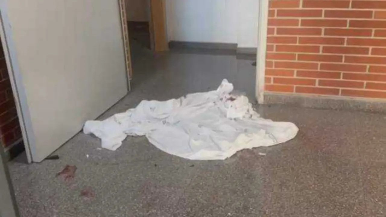 cadáver, rellano, bloque, crimen, asesinato, tiroteo,